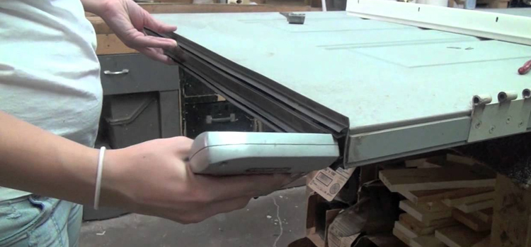 damaged steel door repair Cutler